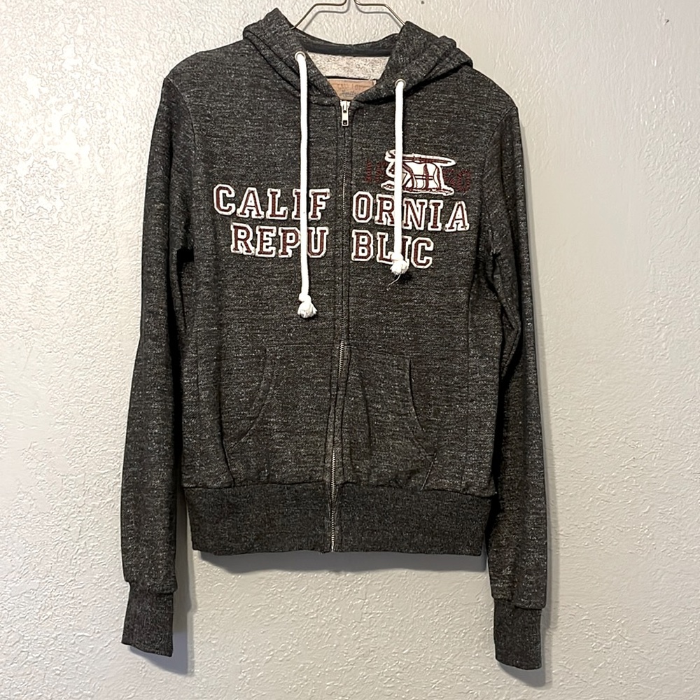 Size small, grey zip up hoodie